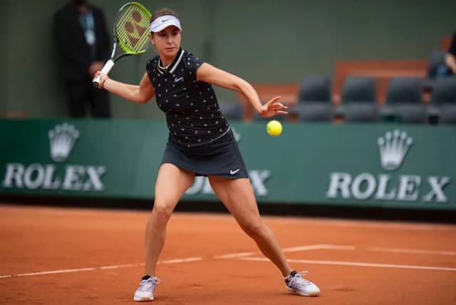 她以顽强意 她以顽强意